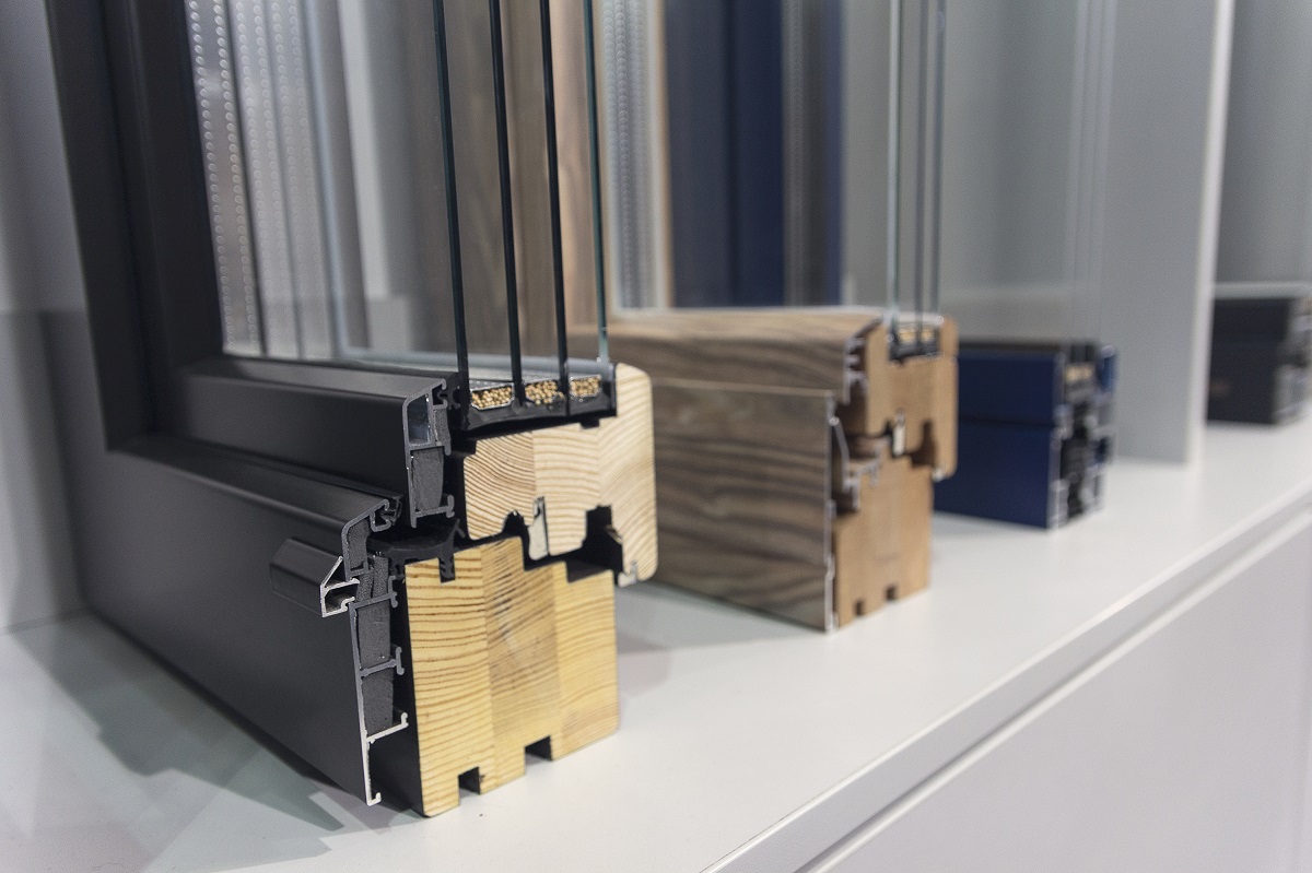 Wooden and aluminum profile for window, doors in the dealer’s exhibition hall